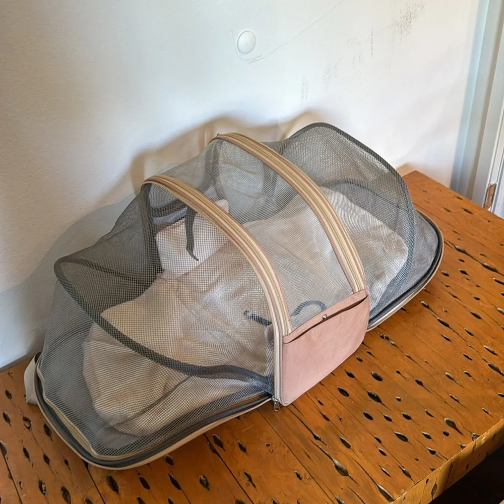 Backpack dog carrier.